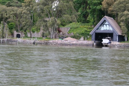 16 BHouse's salmon weir lodge and thatched boathouse Ballynatray House lodge, salmon weir and thatched boathouse
