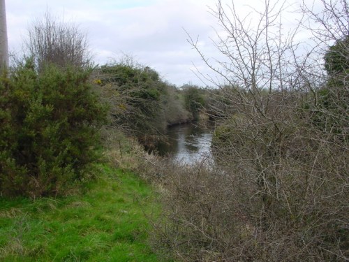 The river sweeping down towards the quay site