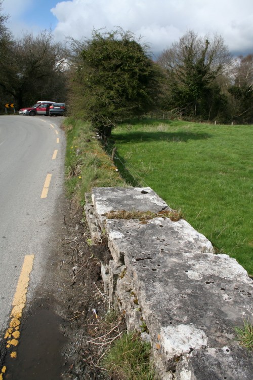 The far wall and the parking place