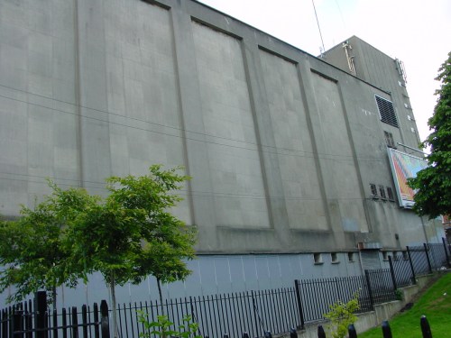 The wall of the cinema dominates the steps