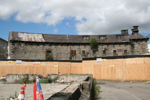 curved-building-needs-attention_resize In behind the curved building