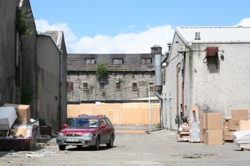 narrower-buildings-on-left-may-be-stone-remnants-of-limerick-closest-and-ballinasloe-stores_resize Note the two narrow buildings