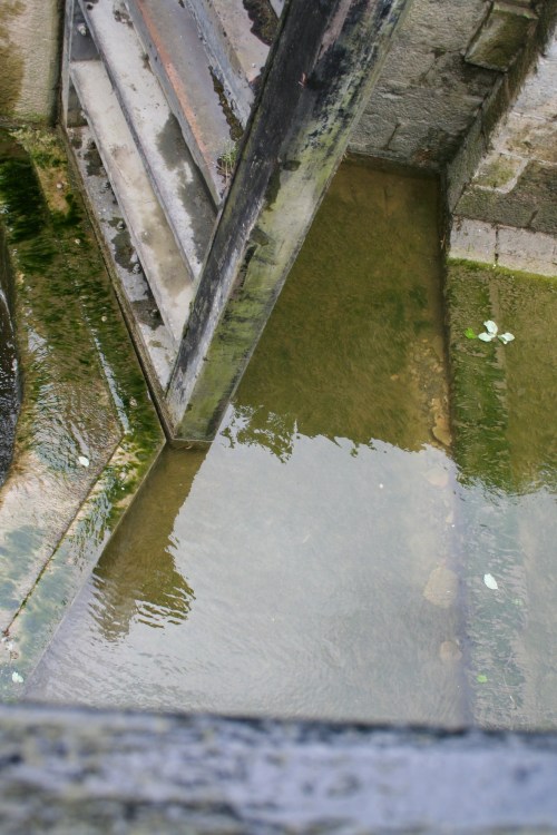 Note that the gate swings in an area slightly lower than the main chamber floor