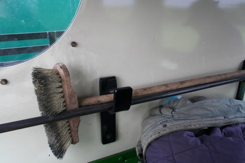 Brush_resize Brush stored across the back of the cab