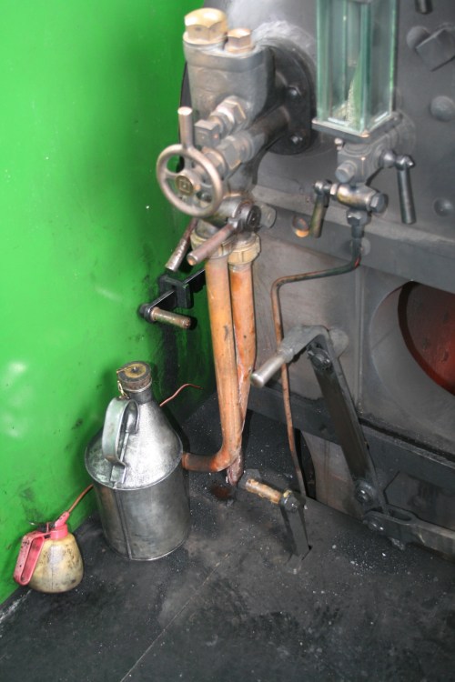 Oil and oilcan_resize Oil and oilcan at front left