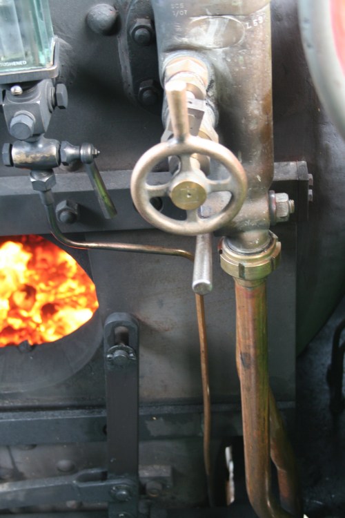 Turning handles to control water I think 1_resize I think that the small wheel ...