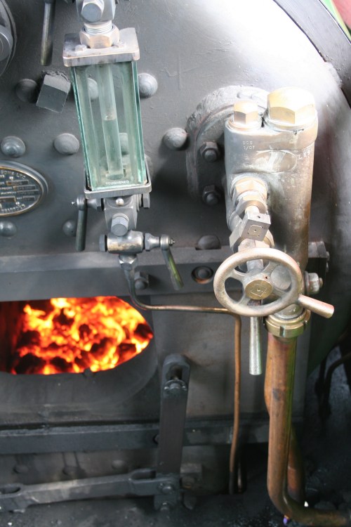 Turning handles to control water I think 2_resize ... adjusts the amount of water going to the boiler