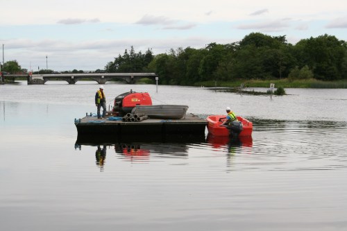 The Pioner and pontoon get under way