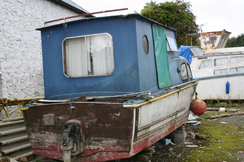 Perhaps GRP hull with wooden transom ashore at Lowtown_resize Wooden transom, but is the hull GRP?