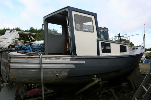 Unidentified wooden cruiser being converted at Lowtown 1_resize Cruiser with new open-backed wheelhouse