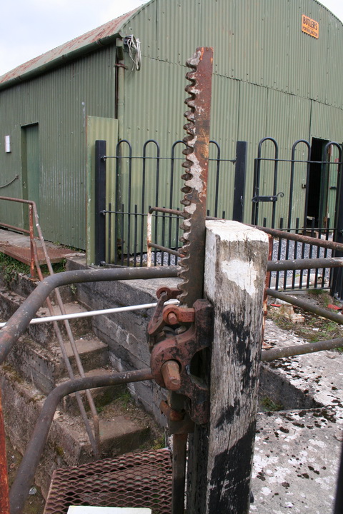 The mechanism (with the covered dry dock behind it)